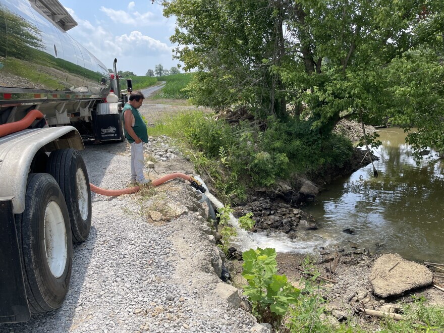 Thousands of gallons of water are being dumped by tanker trucks into Crooked Creek, which flows into Marion’s remaining water supply.