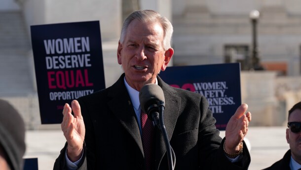 Senator Tommy Tuberville speaks to the crowd as protesters gather outside the Supreme Court as it hears arguments over state laws barring transgender girls and women from playing on school athletic teams on January 13, 2026, in Washington.