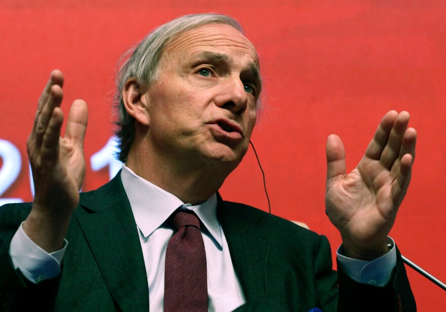FILE - Bridgewater Associates Chairman Ray Dalio speaks during the Economic Summit held for the China Development Forum in Beijing on March 23, 2019.