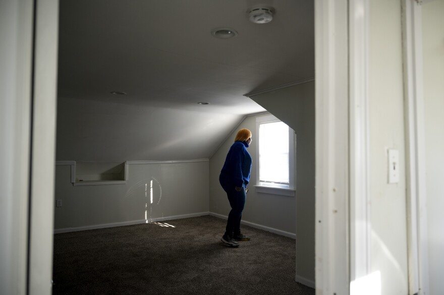 Aleena Thomas looks out at the backyard of the home she's touring. The bedrooms are on the small side, and she would have to choose between having a living room or a dining room. But the prospect of a yard carries a lot of weight.