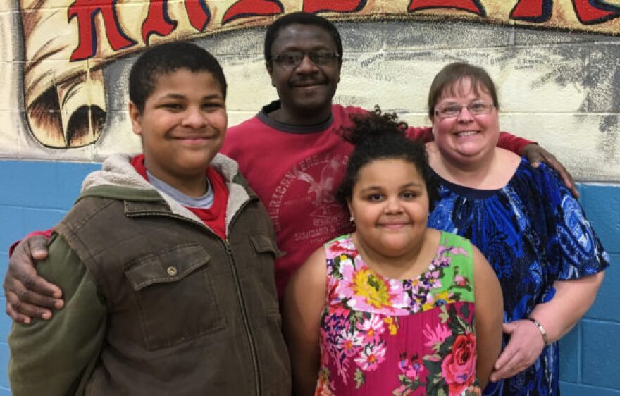 Gideon with his sister Hadassah, father Philip, and his mother, Michelle, a teacher at Middle Creek Elementary.