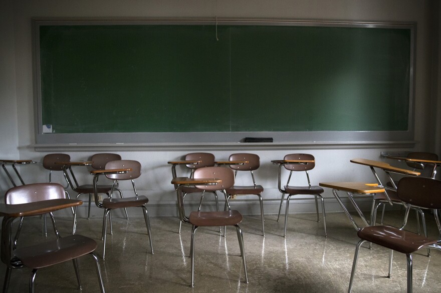 An empty classroom in Parrington Hall where Bangally Fatty was enrolled and taking a class is shown on the University of Washington campus on Thursday, November 16, 2017, in Seattle.