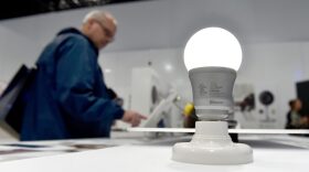 A Rainbow7 Bluetooth smart-enabled lightbulb is illuminated at CES 2016 at the Las Vegas Convention Center on January 6, 2016 in Las Vegas. (David Becker/Getty Images)