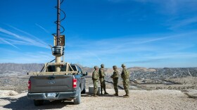 FILE - Army soldiers look at the border wall next to a surveillance vehicle during the visit to the U.S. and Mexico border by Defense Secretary Pete Hegseth in Sunland Park, N.M., Feb. 3, 2025. (AP Photo/Andres Leighton, File)