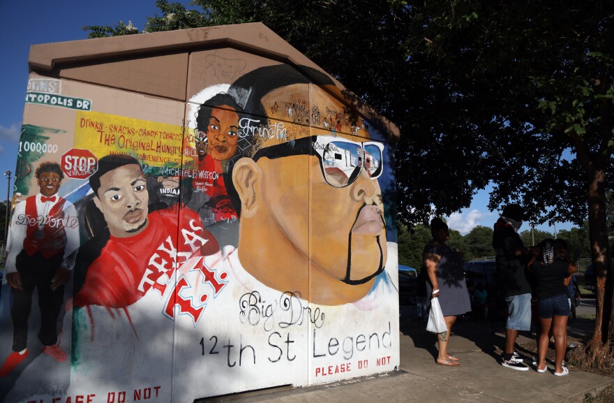 Michael "Malik" Williams' mural started as a memorial for his friend Andre Davis, but it's since grown. 