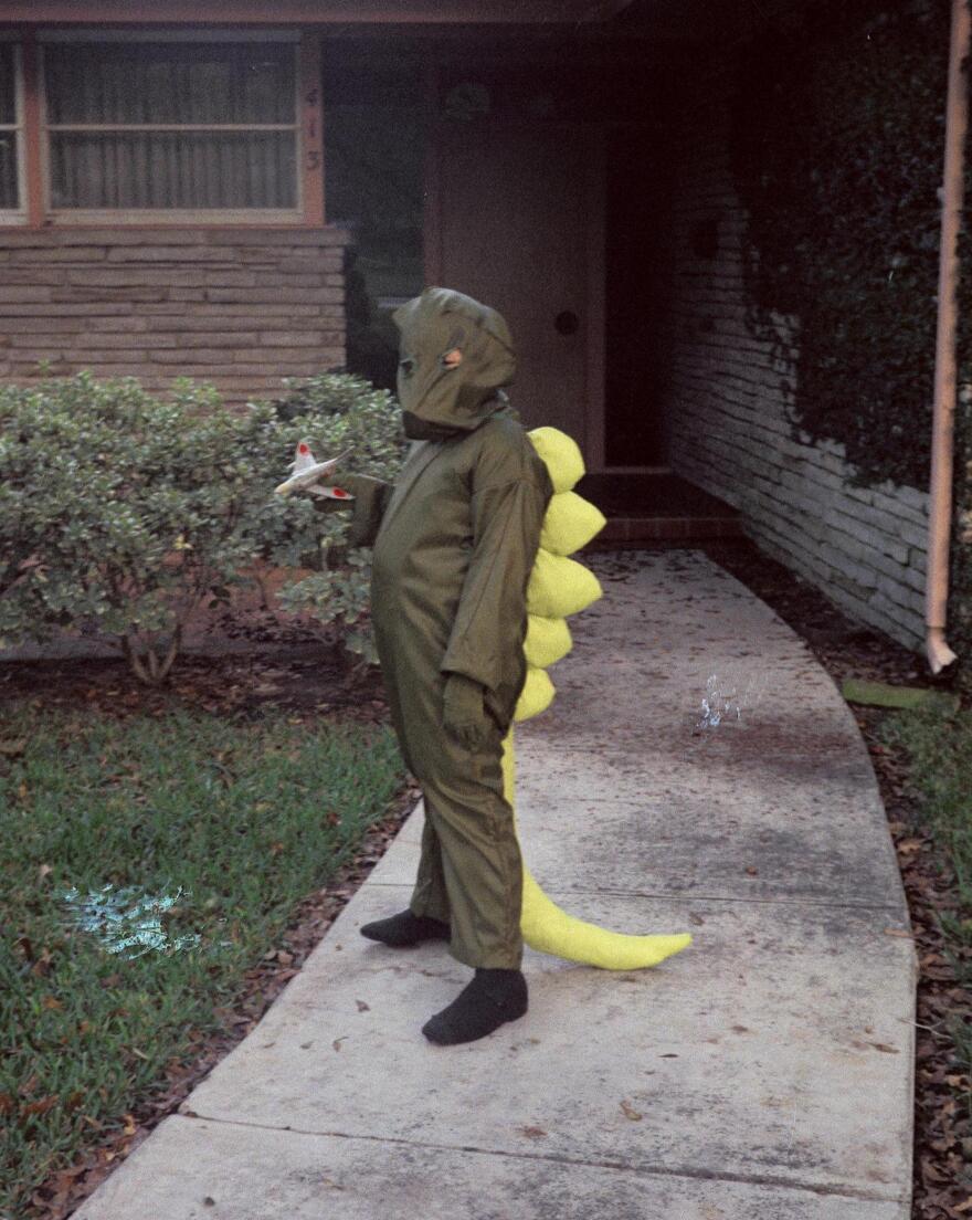 William Tsutsui in 1972 at age 9, in a Godzilla suit made by his mother for Halloween.