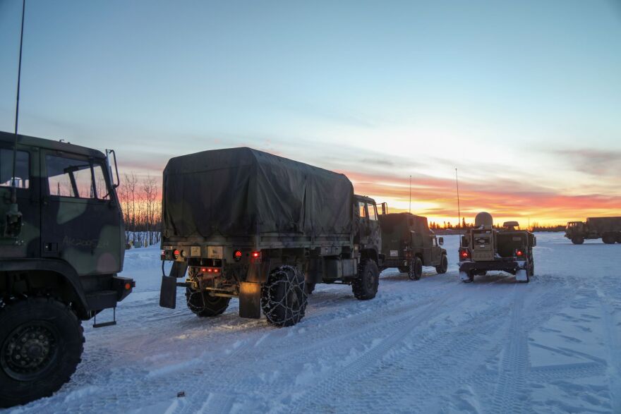 Trucks transporting troops and materiel for paratroopers with the 725th Brigade Support Battalion, 4th Infantry Brigade Combat Team (Airborne), 25th Infantry Division, stage near the Donnelly Training Area in preparation for last year's Joint Pacific Readiness Multinational Readiness Center.