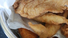Asian carp, battered and fried. As the fish makes its unwelcome way up the Mississippi River, chefs are trying to get people to eat to beat it back.