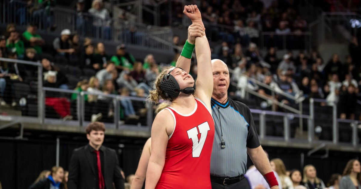 Vermillion freshman Blair Merkwan wins first girls wrestling title for school
