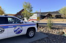 First responder vehicles parked outside a building