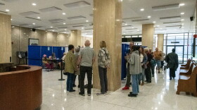 Early voting lines snaked around the lobby at the Rousseau Center on October 21, 2026.