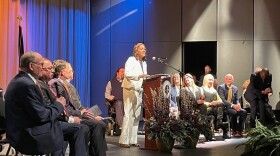 New Mayor Stephanie Terry addresses the crowd inside Bosse High School Auditorium