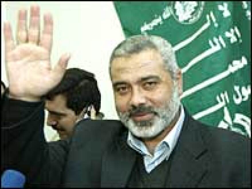 Senior Hamas leader Ismail Haniya waves during a press conference in Gaza City Jan. 26.