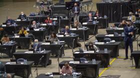Illinois House members gather on the floor of the Bank of Springfield Center on Friday in Springfield to kick off the final five days of the 101st General Assembly. 