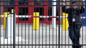 A security guard stands outside the Geo Group ICE detention center during a bond hearing for detained immigrant rights activist Jeanette Vizguerra-Ramirez, Friday, December 19, 2025, in Aurora.