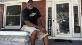 Anthony Wilson sits on his front porch on a Monday afternoon in late August after finishing his work shift.