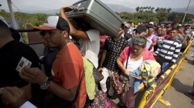 Venezuelan refugees crossing the border into Colombia this year.