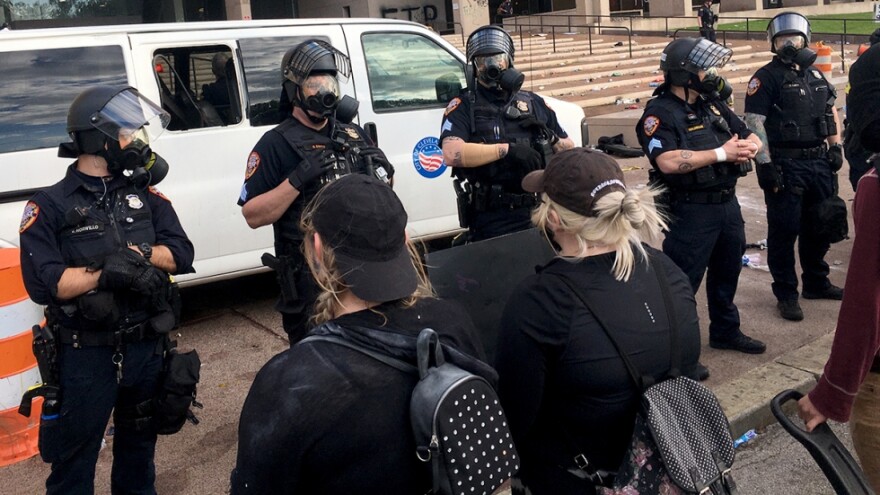 Protesters and police outside the Justice Center during the May 30 protest in Downtown Cleveland. [Nick Castele / ideastream]