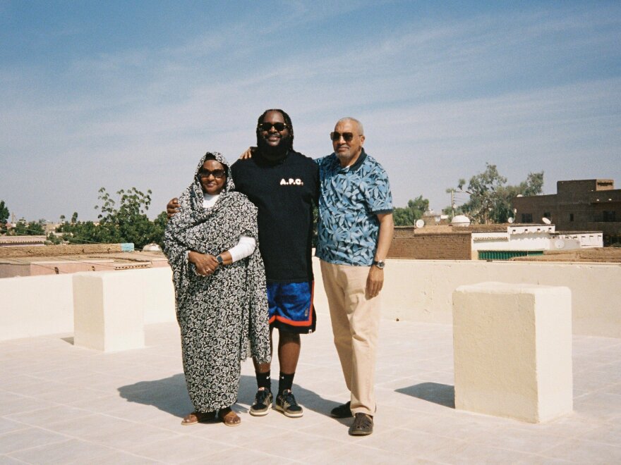 Picture of Sudanese American rapper Bas, with family in Khartoum, during happier times.