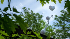 Love Vs Money is installed on the the roof of Kaldi's in Citygarden.