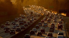 Traffic clogs Highway 101 as people leave work in Los Angeles on Aug. 29, 2014. CREDIT: Mark Ralston/AFP via Getty Images