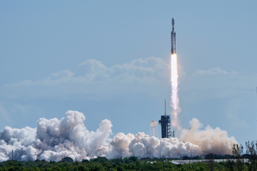 A SpaceX Falcon Heavy rocket lifts off from pad 39A at the Kennedy Space Center in Cape Canaveral, Fla., Wednesday, April 29, 2026. (AP Photo/John Raoux)