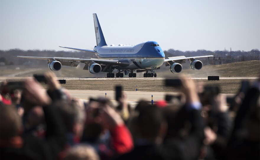 Guests invited to watch President Donald Trump's arrival watch Air Force One touch down at  St. Louis Lambert International Airport.