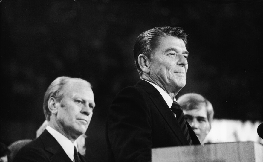 President Gerald Ford listens as future President Ronald Reagan delivers a speech during the closing session of the Republican National Convention in Kansas City in 1976.