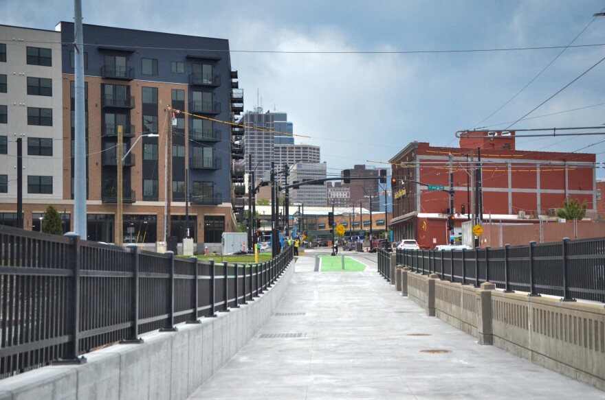 The view from a bridge showing apartment buildings.