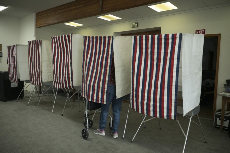 A voter fills out their ballot at the Kodiak harbormaster's office in the afternoon of municipal election day on Oct. 6, 2026.