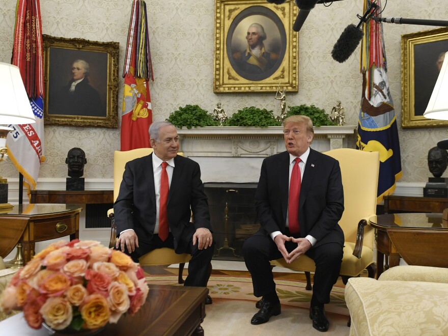 President Trump speaks as Israeli Prime Minister Benjamin Netanyahu looks on, on Aug. 21, 2019. Netanyahu visits the White House again Monday.