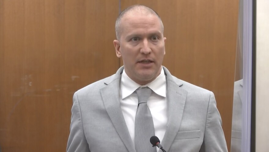 Former Minneapolis police Officer Derek Chauvin addresses the court as Hennepin County Judge Peter Cahill presides over Chauvin's sentencing on Friday at the Hennepin County Courthouse in Minneapolis.