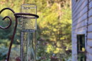A rain gauge showing six inches of rain