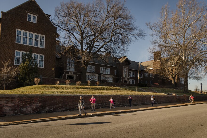 Students leave Dunbar Elementary School in the JeffVanderLou neighborhood. The school has space for 522 students but enrolled just 155 in September.