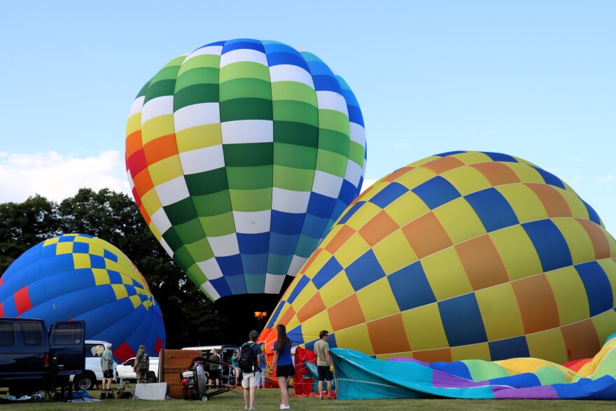 Balloons getting inflated ahead of the opening flight at the Suncook Valley Rotary's 44th annual hot air balloon rally July 31, 2026.