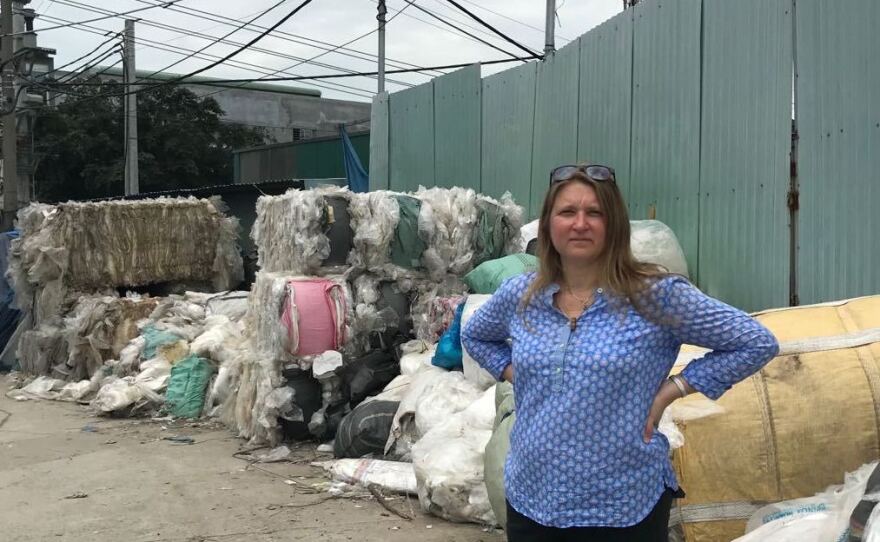 The single largest use for plastic is packaging, Jambeck says. At this recycling center in southeast Asia, much of the waste is thin-film plastic that was once used to package single-use beverage containers.
