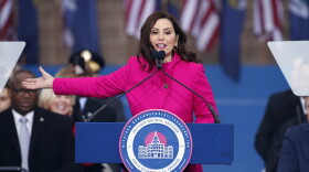 Michigan Gov. Gretchen Whitmer addresses the crowd during inauguration ceremonies, Sunday, Jan. 1, 2023, outside the state Capitol in Lansing, Mich. (AP Photo/Al Goldis)