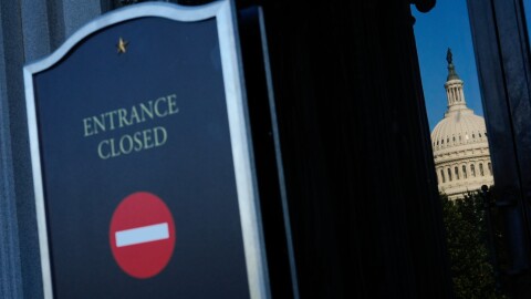 The U.S. Capitol is reflected in the doors of the Library of Congress, which is closed due to a partial government shutdown, Wednesday, Oct. 1, 2025, in Washington.