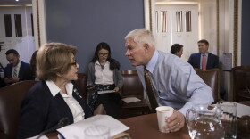 House Rules Committee Chairman Pete Sessions, R-Texas, center, confers with Rep. Louise Slaughter, D-N.Y., the top Democrat, as the panel meets on Capitol Hill in Washington, Thursday, Dec. 21, 2017. (J. Scott Applewhite/AP)