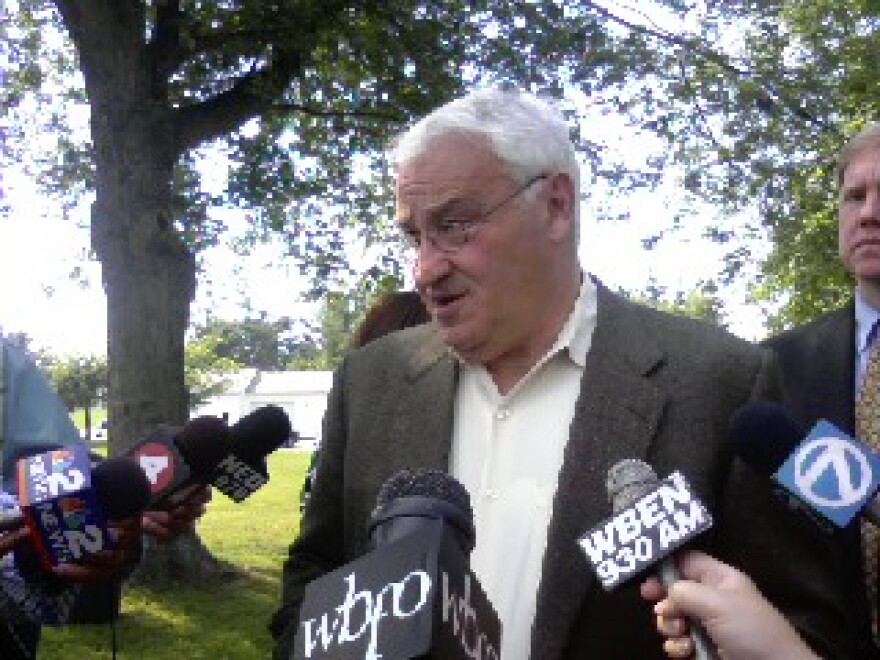 Tom Golisano talks with reporters outisde West Seneca Town Hall