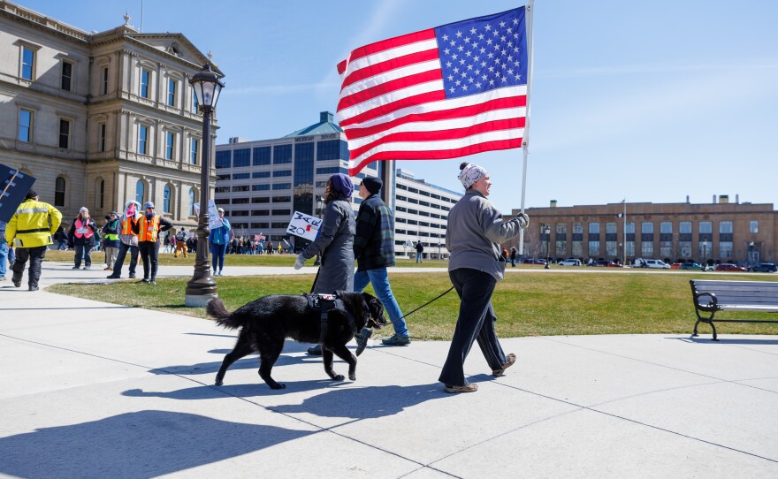 Thousands gathered at the Michigan Capitol in Lansing, Mich., on March 28, 2026, for a No Kings rally.