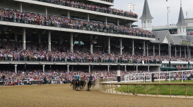 Horses make the first turn as they compete during the 149th running of the Kentucky Derby horse race at Churchill Downs Saturday, May 6, 2023, in Louisville, Ky. (AP Photo/Julio Cortez)