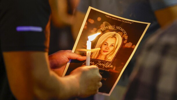 Community members gather for a vigil honoring the life of Iryna Zarutska, who was fatally stabbed on a commuter train last month, Monday, Sept. 22, 2025, in Charlotte, N.C. (AP Photo/Nell Redmond)