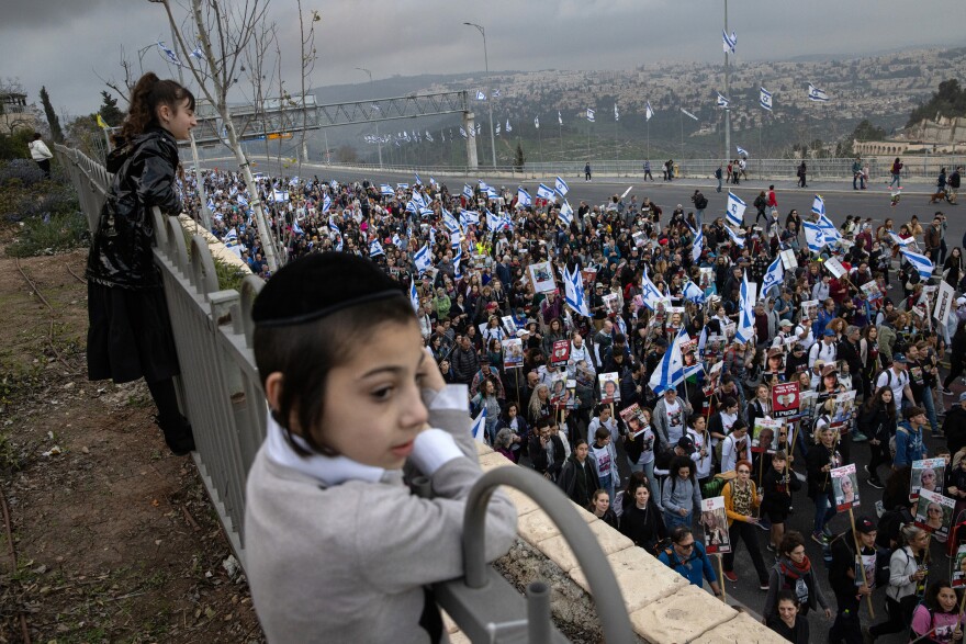 Families of the hostages held in Gaza and supporters make their way through Jerusalem on the march's fourth and final day, on March 2.