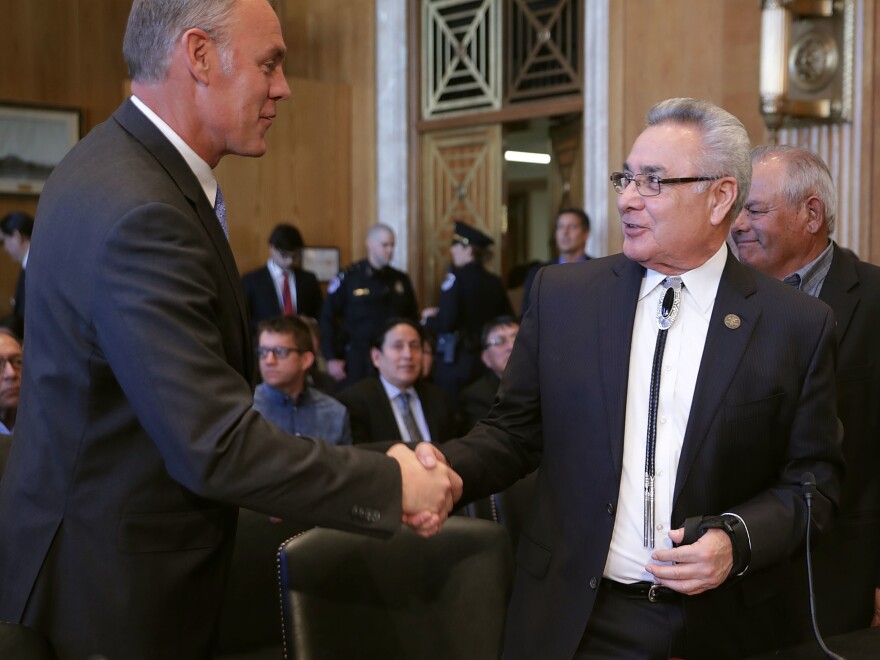 Interior Secretary Ryan Zinke (left) greets National Congress of American Indians President Jefferson Keel before a hearing of the Senate Indian Affairs Committee in March 2017, when both men testified to highlight their priorities for the new Trump administration.