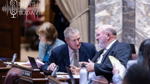 Sen. Jeff Holy (R-Spokane), center, was instrumental in setting aside state funds for local police forces.