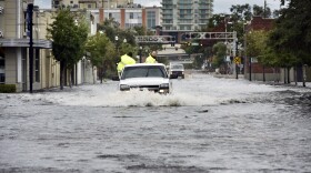 Police plow through floodwaters on Hendricks Avenue in Jacksonville on Monday as Hurricane Irma passes by. (Will Dickey/Florida Times-Union via AP)