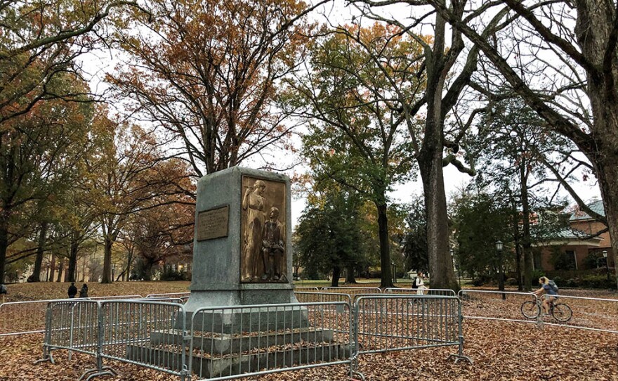 A photo take on December 2, 2018 shows barricades surrounding the pedestal where the Silent Sam statue once stood.