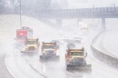 Snow plows make their way down Interstate 44 during the latest round of precipitation on Wednesday, Feb. 12, 2025, in south St. Louis.