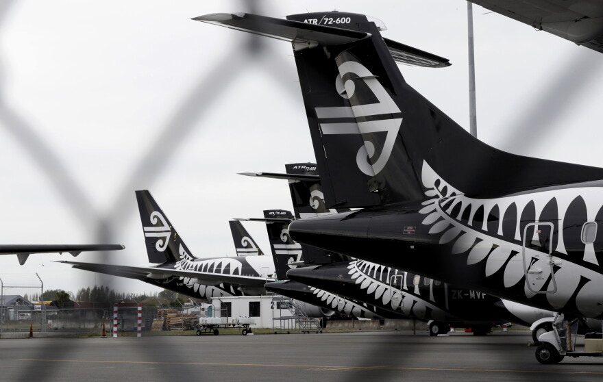 FILE - In this April 6, 2020 file photo Air New Zealand planes sit idle on the tarmac at Christchurch Airport, New Zealand. (AP Photo/Mark Baker, File)